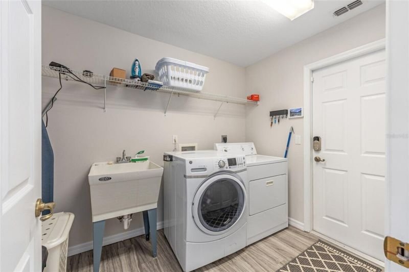 Laundry room with utility sink